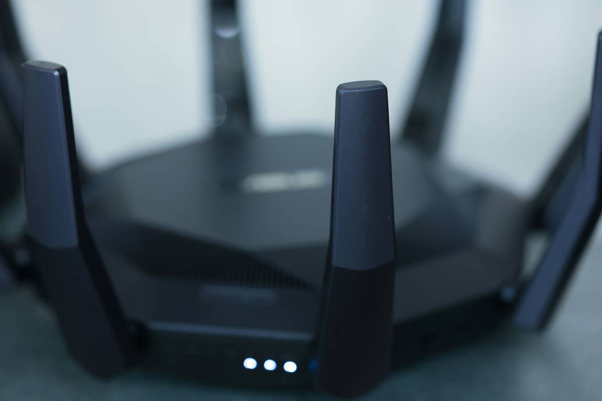 Diagram showing vulnerable devices on a www home security network with firewall and encryption layers